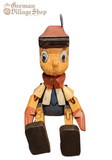 Pinocchio - Wooden Sitting Figure Pinocchio - Wooden Sitting Figure