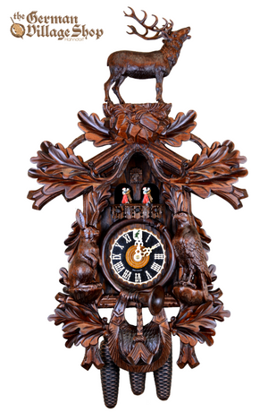 German Cuckoo Clock 8 day mechanical Hones traditional cuckoo clock from the black forest before the hunt scene 