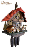Cuckoo Clock Mechanical 8 Day - Hones Red Roof Chalet German Cuckoo Clock 8 day mechanical Hones chalet from the black forest with a red roof and clock peddler