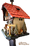 Cuckoo Clock Mechanical 8 Day - Hones Red Roof Chalet German Cuckoo Clock 8 day mechanical Hones chalet from the black forest with a red roof and clock peddler