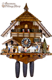 Cuckoo Clock Mechanical 8 Day - Hones Chalet & Wood Carver German Cuckoo Clock 8 day mechanical Hones chalet featuring black forest scene. Wood Carver and Walking Peddler