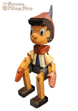 Pinocchio - Wooden Sitting Figure