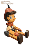 Pinocchio - Wooden Sitting Figure