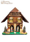 Weatherhouse - Bavarian house with carved figurines 22x23cm