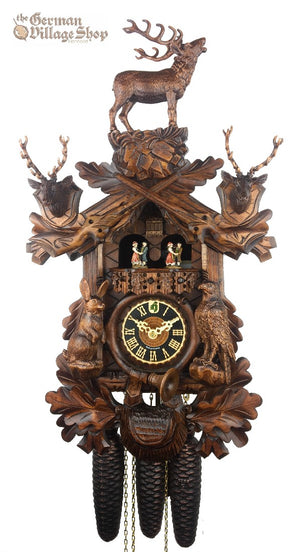 German Cuckoo Clock 8 day mechanical hunters scene with stag and stag heads