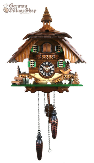 German Cuckoo Clock battery operated black forest chalet with dog and cuckoo bird