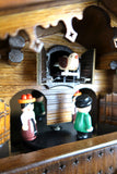 German Cuckoo Clock battery operated black forest chalet with beer drinkers and music cuckoo bird