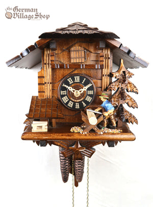 German Cuckoo Clock 1 day mechanical black forest chalet wood saw-man