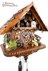 German Cuckoo Clock battery operated black forest chalet with moving beer drinker and music