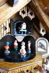 German Cuckoo Clock battery operated black forest chalet with moving beer drinker and music