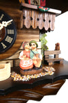 German Cuckoo Clock battery operated black forest chalet with music and moving kissing couple