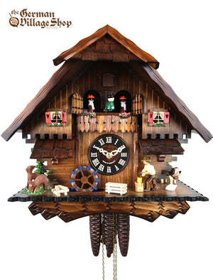 German Cuckoo Clock 1 day mechanical black forest chalet with music and wood chopper