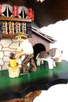 German Cuckoo Clock 1 day mechanical black forest chalet with music and moving wood chopper