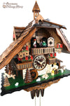 German Cuckoo Clock 1 day mechanical black forest chalet with music and moving wood chopper