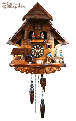 German Cuckoo Clock battery operated black forest chalet with wood sawyer men and music