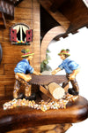 German Cuckoo Clock battery operated black forest chalet with wood sawyer men and music