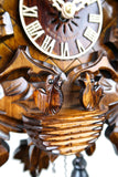 German Cuckoo Clock battery operated with cuckoo bird carvings and music