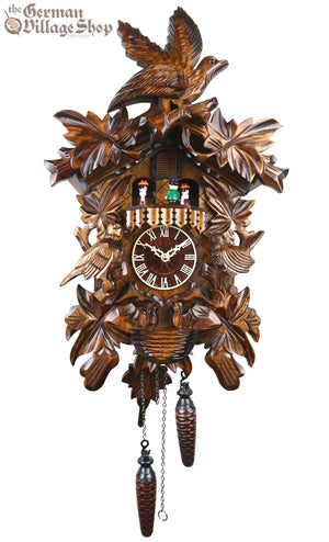 German Cuckoo Clock battery operated with cuckoo bird carvings and music