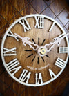German Cuckoo Clock 8 day mechanical traditional cuckoo bird carvings - close up of clock dial