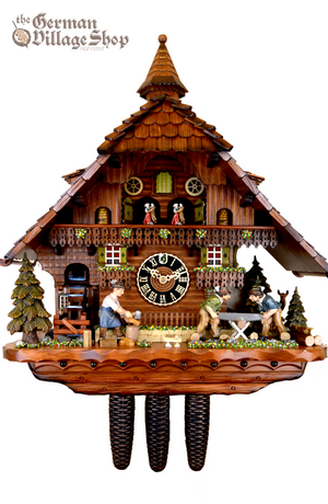 German Cuckoo Clock 8 day mechanical Hones chalet from the black forest with wood chopper and wood Sawyer men