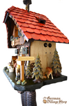 German Cuckoo Clock 8 day mechanical Hones chalet from the black forest with a red roof and clock peddler