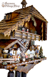 German Cuckoo Clock 8 day mechanical Hones chalet featuring black forest scene. wood carver and clock peddler