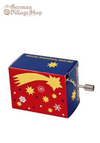 A rectangular music box with a silver hand crank extruding from side. The box is red and navy blue with gold stars.