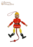 A jumping jack in red and yellow fireman's outfit. Pull the strings and his limbs jump.