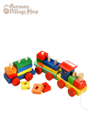 A brightly coloured train is made from an assortment of different blocks which when put together, create the carriages.